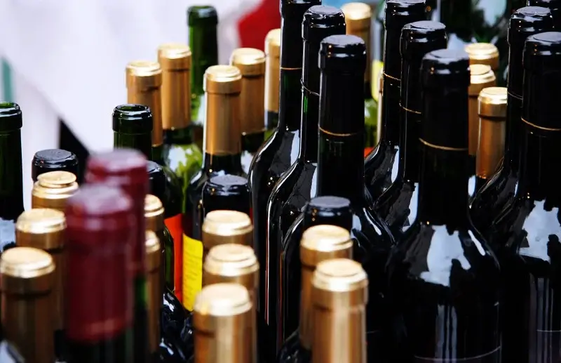Keeping Bottles Upright Instead of Horizontal